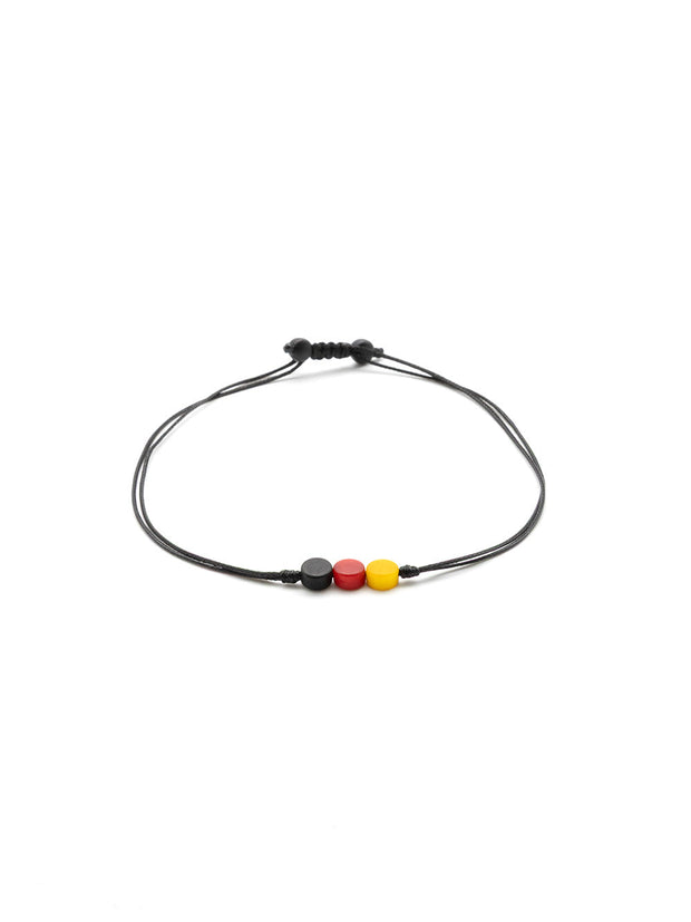 Armband Tripipu-DE Schwarz/Rot/Gold - La Tagua Nuss